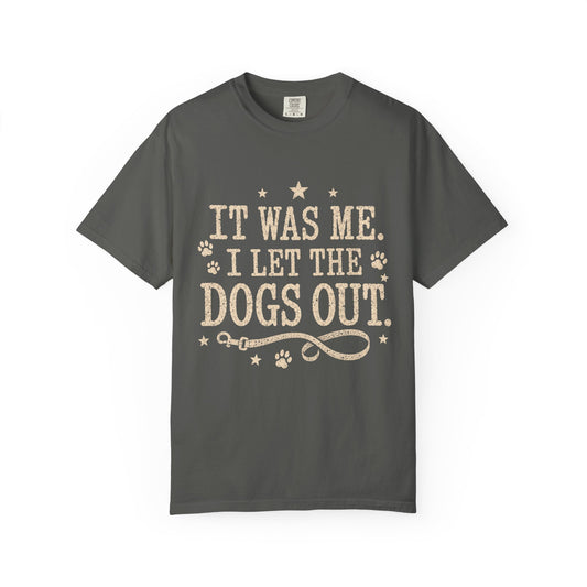 Brown t-shirt with 'It was me, I let the dogs out' text on a white background